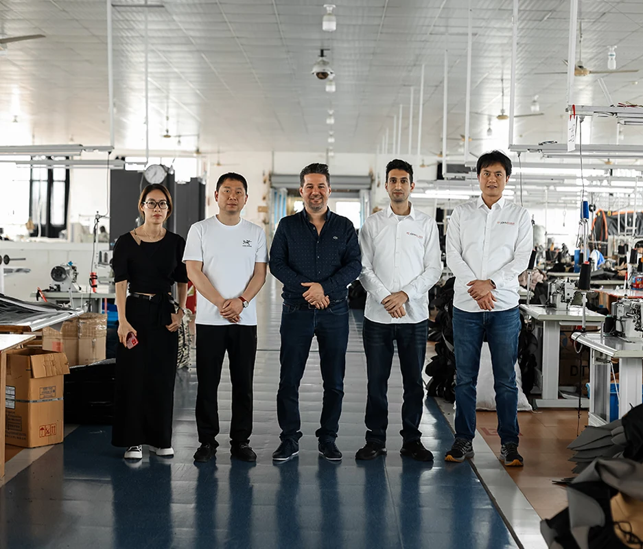 JohnElina team visiting a manufacturing partner
